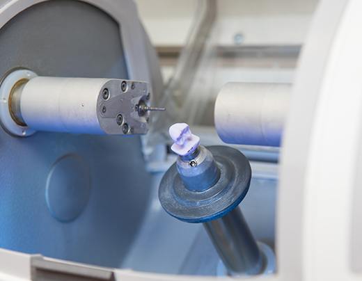 CEREC millin unit crafting a dental crown
