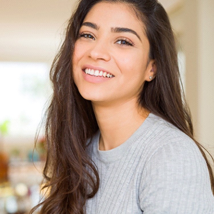 Woman smiling with cosmetic dental bonding in Boerne