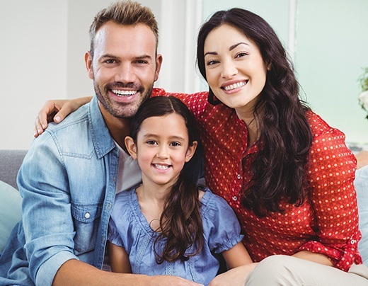 Smiling family after dental office visit