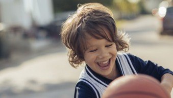 Young boy with healthy smile thanks to children's dentistry