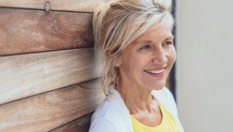 Woman with healthy smile thanks to restorative dentistry