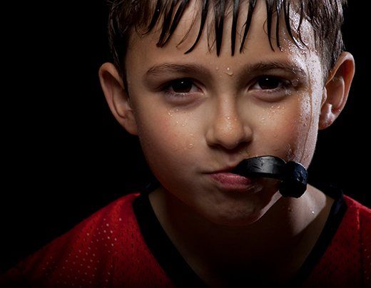 Teen boy with athletic mouthguard