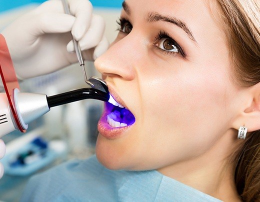 Patient receiving dental bonding