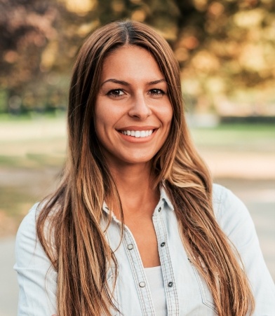 Woman sharing smile after cosmetic dentistry