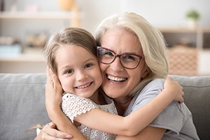 patient smiling after getting dental implants in Boerne