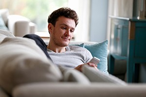 Man resting on the couch