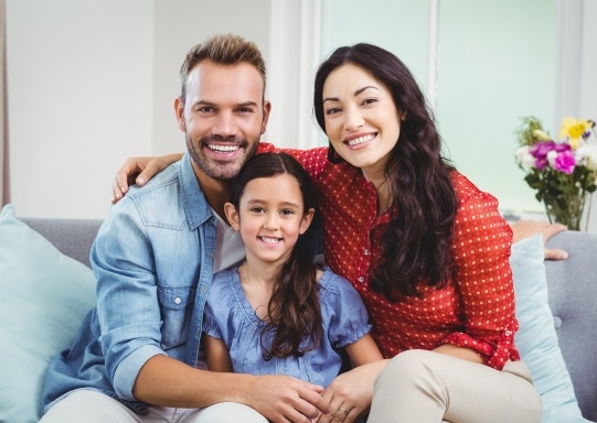 Family without dental insurance making use of in-house discounts
