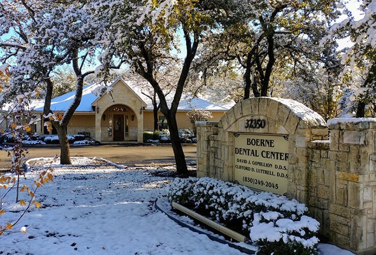 View of the Boerne texas dental office and Boerne Dental Center sign