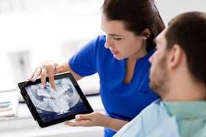 Patient viewing his X-rays in the dentist’s office