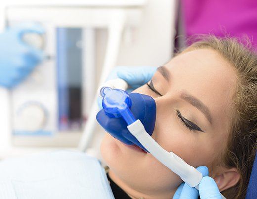 Female patient with nitrous oxide sedation mask